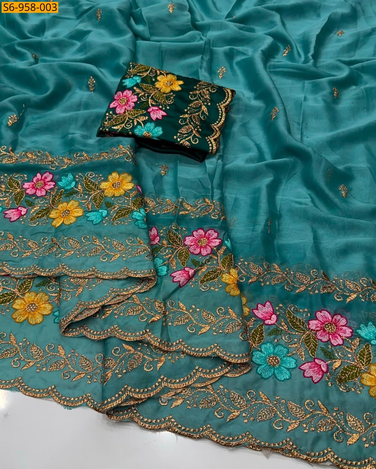 Teal Fancy Star Georgette Saree